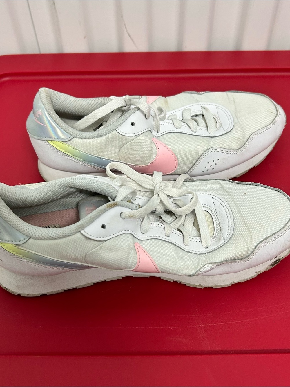 Nike Women's White Sneakers with Pink Swoosh and Iridescent Heel